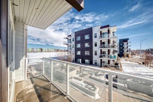 209-4250 Seton Drive Se, Calgary, AB - Outdoor With Balcony