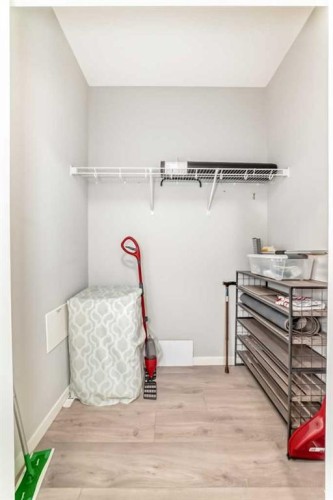 209-4250 Seton Drive Se, Calgary, AB - Indoor With Storage