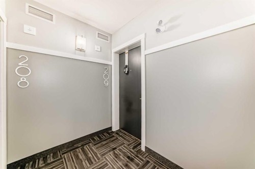 209-4250 Seton Drive Se, Calgary, AB - Indoor Photo Showing Other Room