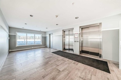 209-4250 Seton Drive Se, Calgary, AB - Indoor Photo Showing Other Room