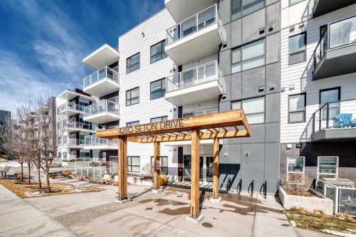209-4250 Seton Drive Se, Calgary, AB - Outdoor With Balcony