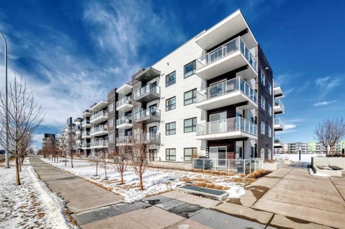 209-4250 Seton Drive Se, Calgary, AB - Outdoor With Balcony With Facade