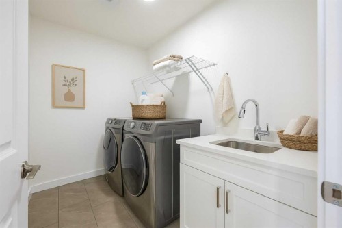 312 Edgefield Close, Strathmore, AB - Indoor Photo Showing Laundry Room
