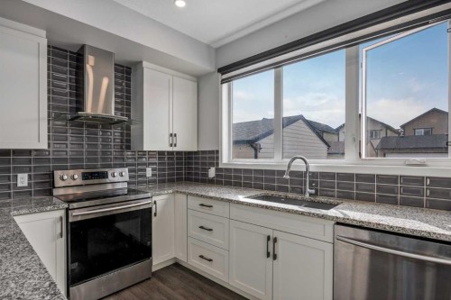 77 Masters Street Se, Calgary, AB - Indoor Photo Showing Kitchen With Upgraded Kitchen