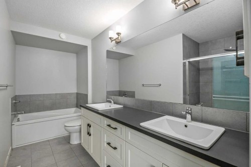 77 Masters Street Se, Calgary, AB - Indoor Photo Showing Bathroom