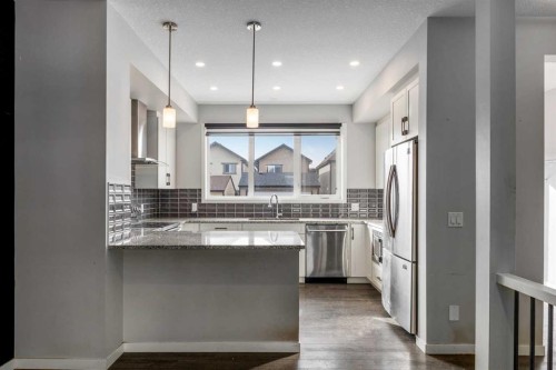 77 Masters Street Se, Calgary, AB - Indoor Photo Showing Kitchen With Upgraded Kitchen