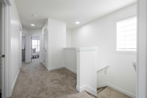 48 Heritage Manor, Cochrane, AB - Indoor Photo Showing Other Room