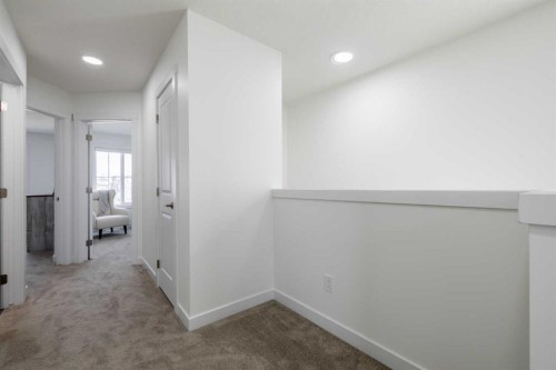 48 Heritage Manor, Cochrane, AB - Indoor Photo Showing Other Room