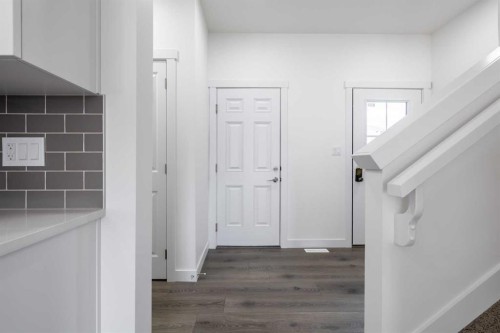 48 Heritage Manor, Cochrane, AB - Indoor Photo Showing Other Room