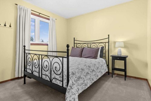 31 River Rock Manor Se, Calgary, AB - Indoor Photo Showing Bedroom