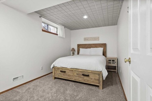 31 River Rock Manor Se, Calgary, AB - Indoor Photo Showing Bedroom