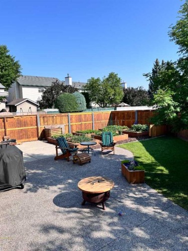 31 River Rock Manor Se, Calgary, AB - Outdoor With Backyard