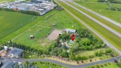 338067 1064 Drive EAST Rural Foothills County, AB T1S 4T2