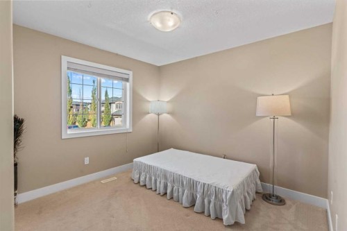 1269 Sherwood Boulevard Nw, Calgary, AB - Indoor Photo Showing Bedroom