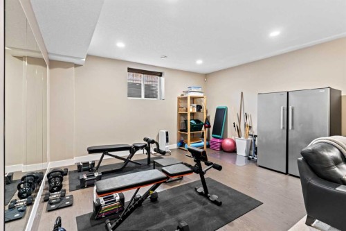 1269 Sherwood Boulevard Nw, Calgary, AB - Indoor Photo Showing Gym Room