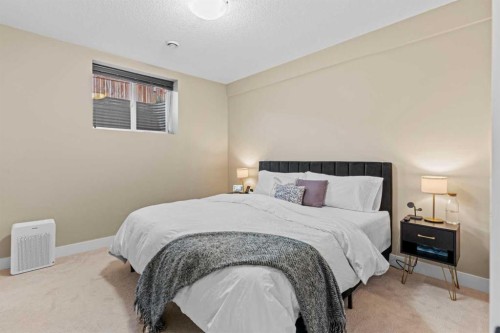 1269 Sherwood Boulevard Nw, Calgary, AB - Indoor Photo Showing Bedroom