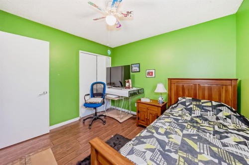 17007 Sunvale Road Se, Calgary, AB - Indoor Photo Showing Bedroom
