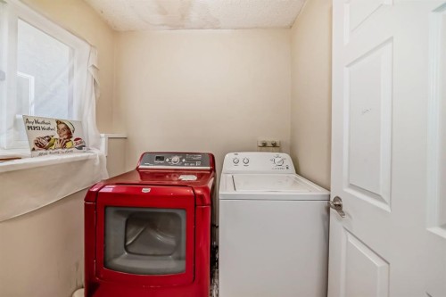17007 Sunvale Road Se, Calgary, AB - Indoor Photo Showing Laundry Room