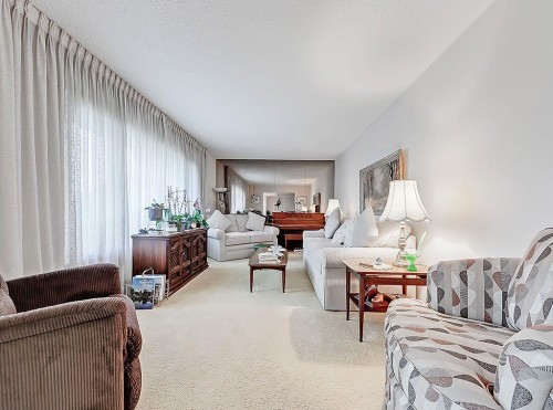 9432 Almond Crescent Se, Calgary, AB - Indoor Photo Showing Living Room