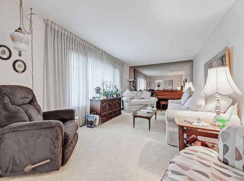 9432 Almond Crescent Se, Calgary, AB - Indoor Photo Showing Living Room