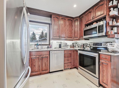 9432 Almond Crescent Se, Calgary, AB - Indoor Photo Showing Kitchen