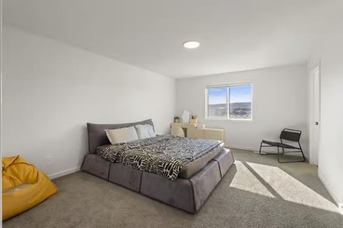 75 Royston Heath Nw, Calgary, AB - Indoor Photo Showing Bedroom