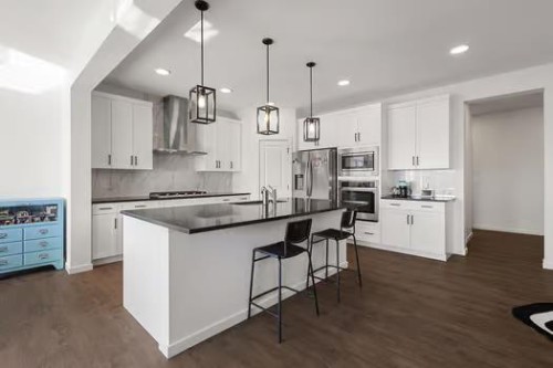 75 Royston Heath Nw, Calgary, AB - Indoor Photo Showing Kitchen With Upgraded Kitchen