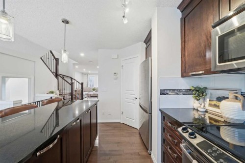 189 Elgin Meadows Park Se, Calgary, AB - Indoor Photo Showing Kitchen With Upgraded Kitchen