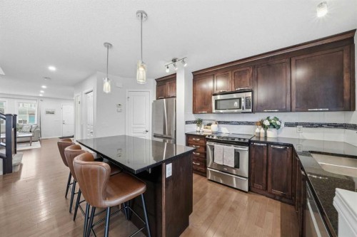 189 Elgin Meadows Park Se, Calgary, AB - Indoor Photo Showing Kitchen With Stainless Steel Kitchen With Double Sink With Upgraded Kitchen