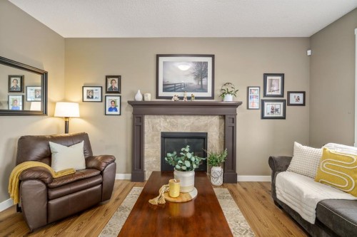 109 Ranch Rise, Strathmore, AB - Indoor Photo Showing Living Room With Fireplace