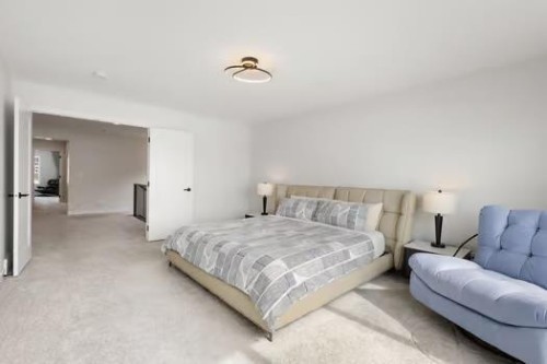 67 Royston Heath Nw, Calgary, AB - Indoor Photo Showing Bedroom