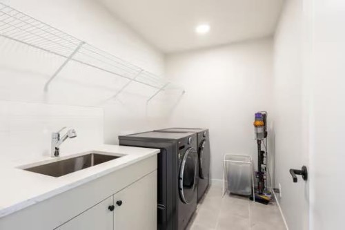 67 Royston Heath Nw, Calgary, AB - Indoor Photo Showing Laundry Room