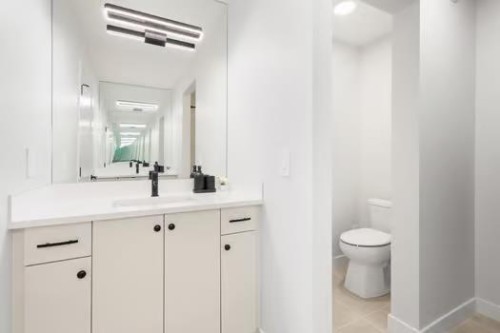 67 Royston Heath Nw, Calgary, AB - Indoor Photo Showing Bathroom