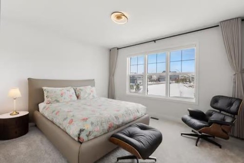 67 Royston Heath Nw, Calgary, AB - Indoor Photo Showing Bedroom