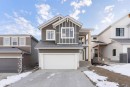 303 Rivercrest Way, Cochrane, AB  - Outdoor With Facade 