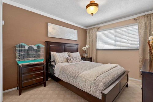 19 Beaupre Crescent Nw, Calgary, AB - Indoor Photo Showing Bedroom