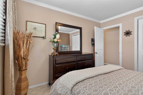 19 Beaupre Crescent Nw, Calgary, AB - Indoor Photo Showing Bedroom