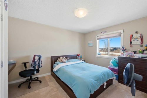 212 Springmere Road, Chestermere, AB - Indoor Photo Showing Bedroom
