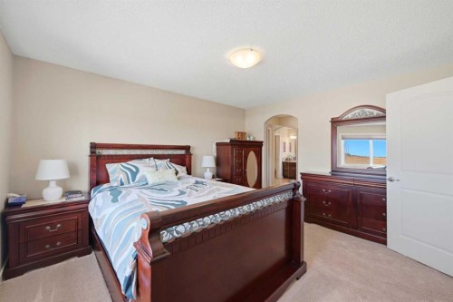212 Springmere Road, Chestermere, AB - Indoor Photo Showing Bedroom
