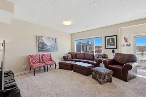 212 Springmere Road, Chestermere, AB - Indoor Photo Showing Living Room