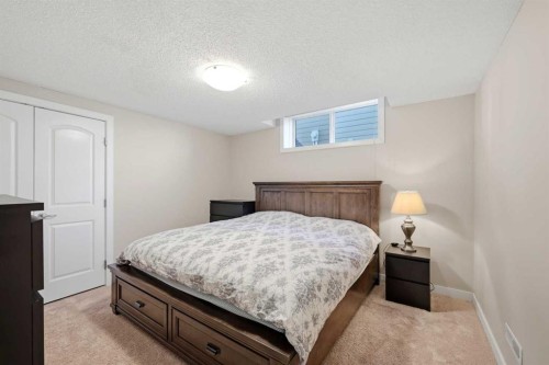 212 Springmere Road, Chestermere, AB - Indoor Photo Showing Bedroom