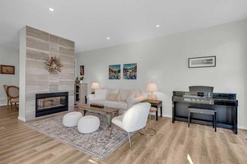 2729 Cochrane Road Nw, Calgary, AB - Indoor Photo Showing Living Room With Fireplace