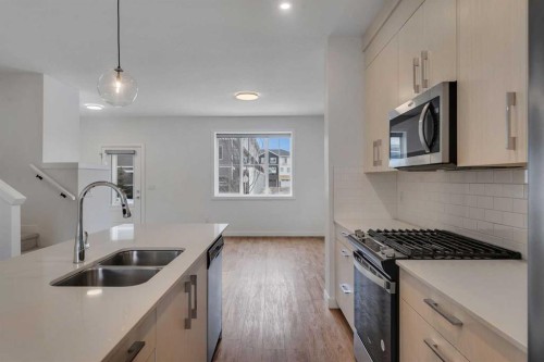 103 Cornerstone Path Ne, Calgary, AB - Indoor Photo Showing Kitchen With Double Sink With Upgraded Kitchen