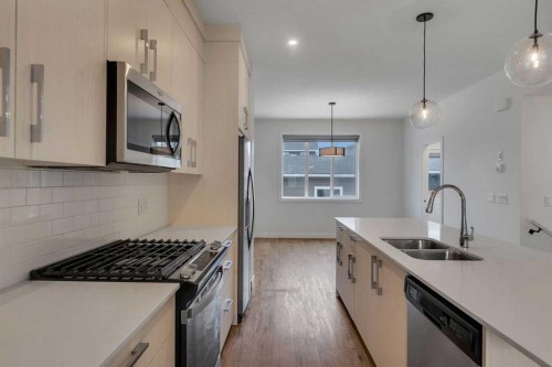 103 Cornerstone Path Ne, Calgary, AB - Indoor Photo Showing Kitchen With Double Sink With Upgraded Kitchen