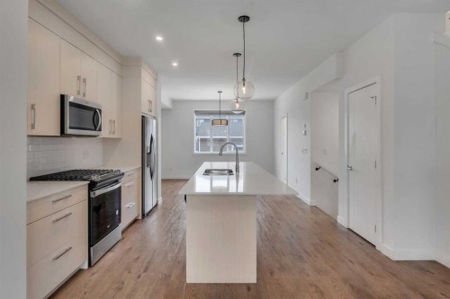 103 Cornerstone Path Ne, Calgary, AB - Indoor Photo Showing Kitchen With Double Sink With Upgraded Kitchen