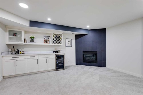9810 Hidden Valley Drive Nw, Calgary, AB - Indoor With Fireplace