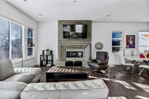 405 29 Avenue Ne, Calgary, AB - Indoor Photo Showing Living Room With Fireplace