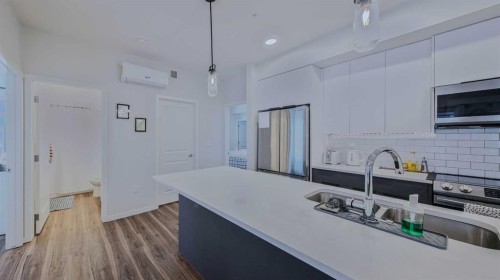 2209-33 Carringham Gate Nw, Calgary, AB - Indoor Photo Showing Kitchen With Upgraded Kitchen