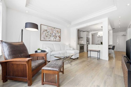 101-121 Quarry Way Se, Calgary, AB - Indoor Photo Showing Living Room