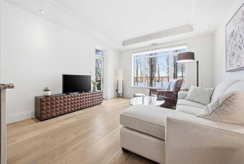 101-121 Quarry Way Se, Calgary, AB - Indoor Photo Showing Living Room